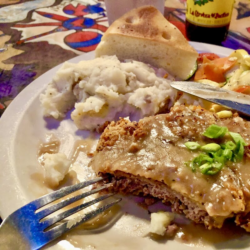 Dinner plate with mashed potatoes, bread, and gravy at a park dining hall in Big Bend National Park.