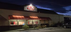 Exterior view of a restaurant in Ellsworth near Acadia National Park, photographed at night.