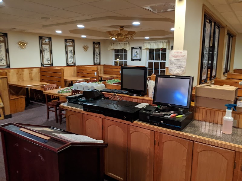 Restaurant dining area inside Acadia National Park, with wooden booths and a service counter