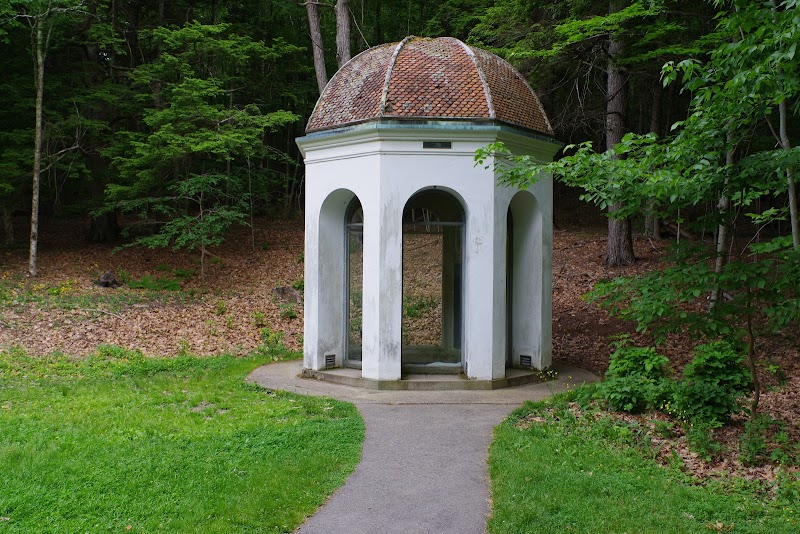 Sieur de Monts Spring pavilion along a shaded woodland path in Acadia National Park