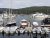 Northeast Harbor marina scene with moored boats along the harbor in Acadia National Park, Maine.