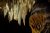 Stalactites and cave drapery hang in Carlsbad Caverns National Park's Big Room.