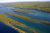 Aerial view of forested island archipelago and inlets across Isle Royale National Park on Lake Superior.