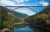 New River Gorge Bridge spans the gorge in New River Gorge National Park & Preserve, flanked by forested cliffs.