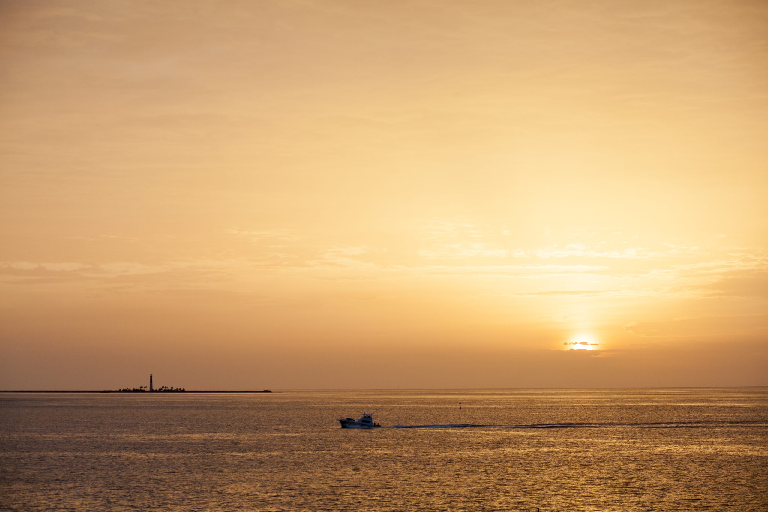 Sunset over the Caribbean waters near Garden Key Lighthouse, Dry Tortugas National Park, Florida.