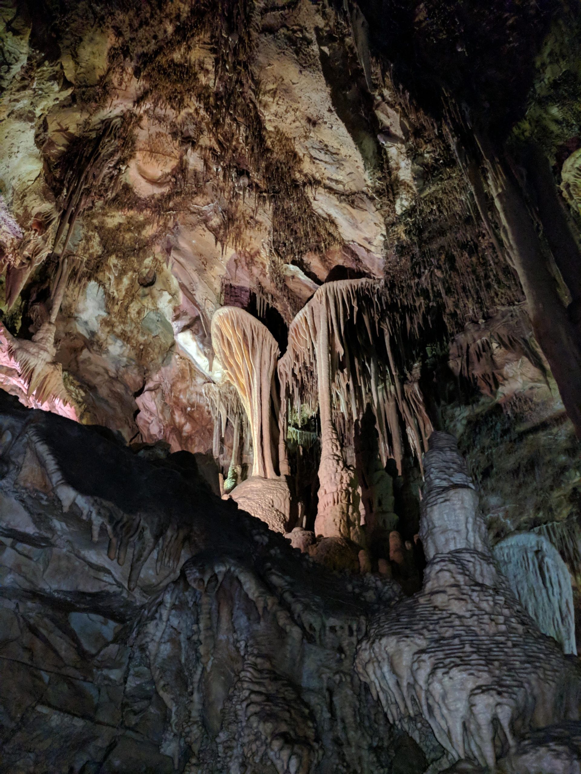 Inside Lehman Caves at Great Basin National Park, dramatic stalactites and stalagmites create a sculpted cave landscape.