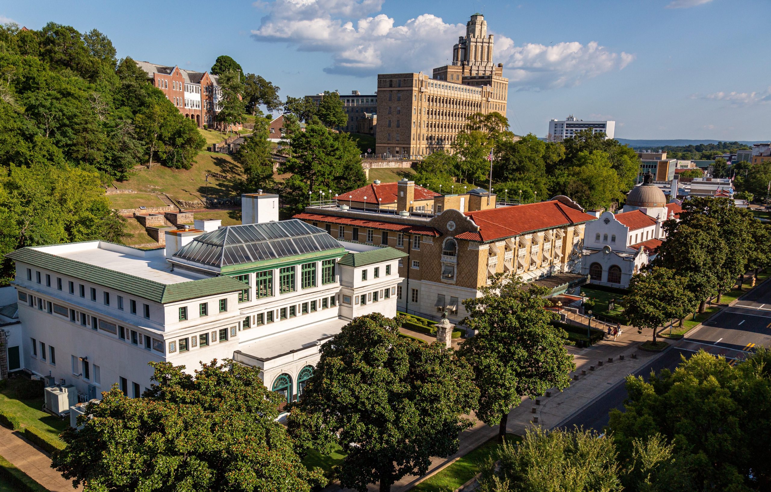 Fordyce Bathhouse on Bathhouse Row in Hot Springs National Park, Arkansas, showcasing early 20th-century architecture along a tree-lined street.