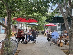 Outdoor dining patio along a tree-lined street in Black Canyon of the Gunnison National Park.