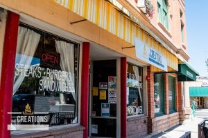 Creations on Main Delta storefront on Main Street near Black Canyon of the Gunnison National Park, a casual dining shop with striped awning.