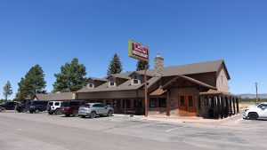 Bryce Canyon Pines Restaurant at Bryce Canyon National Park housed in a lodge-style stone and wood building.
