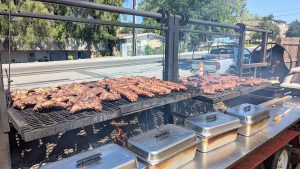 Barbecue grill loaded with ribs at a lodge grill station near Channel Islands National Park.