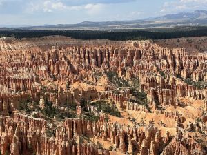 Bryce Canyon National Park hoodoos near Cannonville Visitor Center, dramatic orange rock spires rise across the canyon