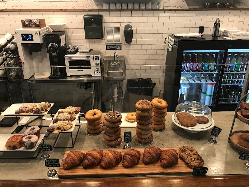 Cafe counter with fresh bagels croissants and coffee in Whitefish Montana