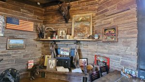 Capitol Reef National Park restaurant interior with stone walls, elk mount, and western decor.