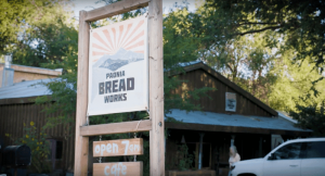 Rustic signboard for a cafe outside a wooden building near Black Canyon Of The Gunnison National Park.
