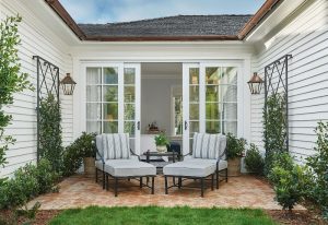 Cozy resort courtyard patio with gray cushioned chairs in Channel Islands National Park.
