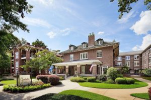 Brick hotel exterior in a landscaped campus-like setting near Congaree National Park in Columbia, South Carolina.