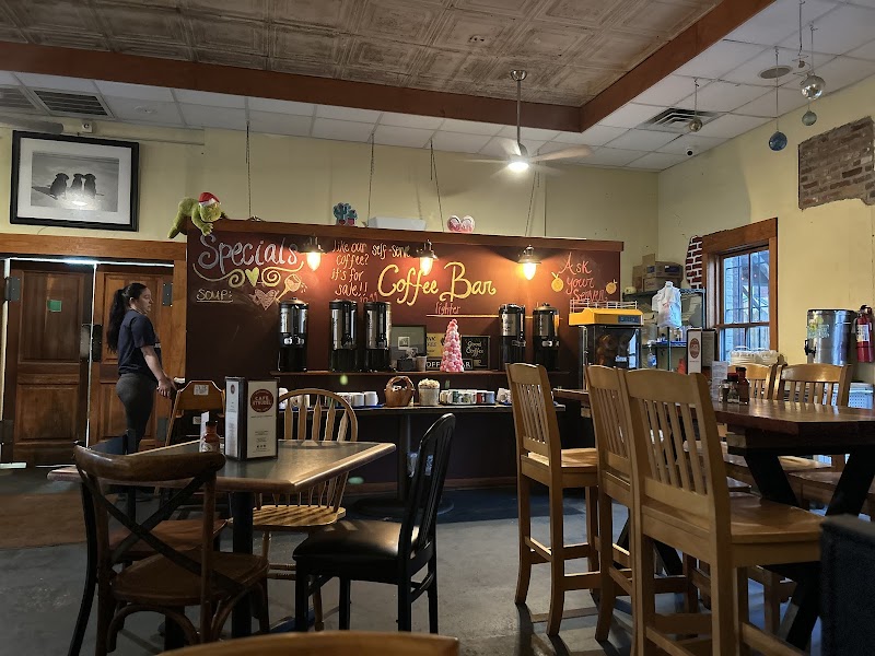 Cozy cafe interior with wooden tables and chairs and coffee bar in Montana