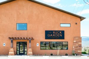 Capitol Reef National Park restaurant exterior with warm orange walls and modern entryway.