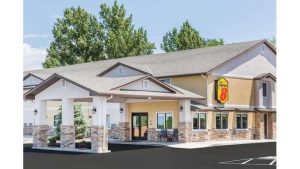 Lodge-style hotel exterior with stone pillars and a covered entrance in the Montrose area near Black Canyon of the Gunnison National Park.