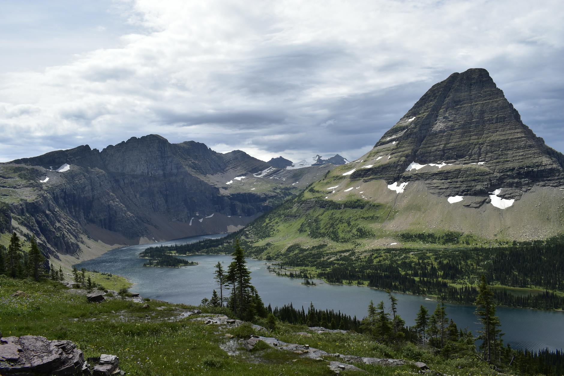 Stunning view of mountain landscape with lake in Glacier National Park, Montana.
