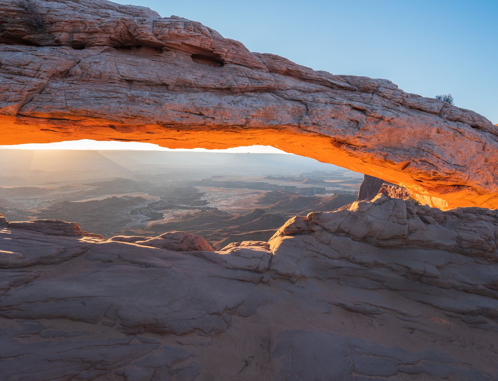 Captivating view of Mesa Arch at sunrise, Canyonlands National Park, Moab, Utah, USA.
