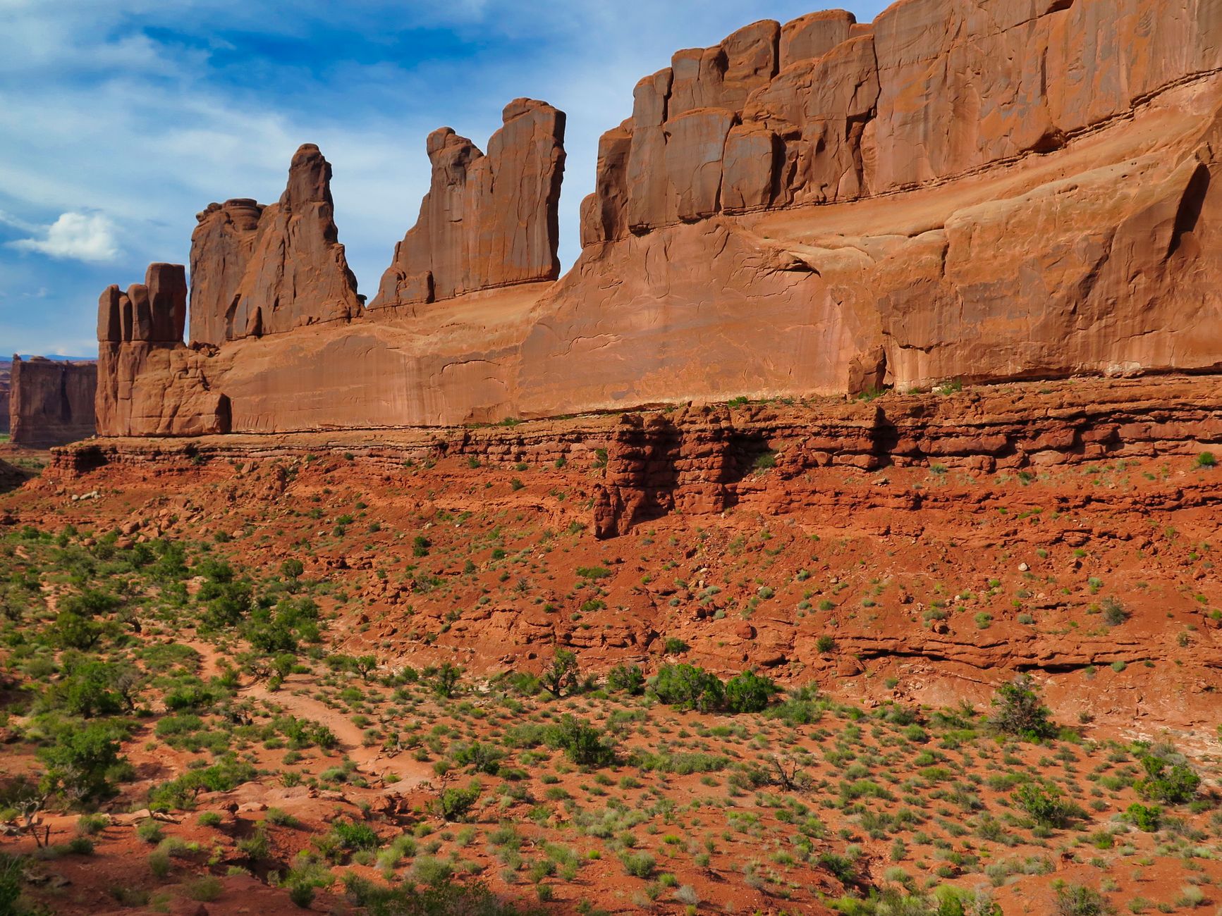 Explore the stunning red rock formations in Utah's desert landscape, offering a vivid display of natural beauty.