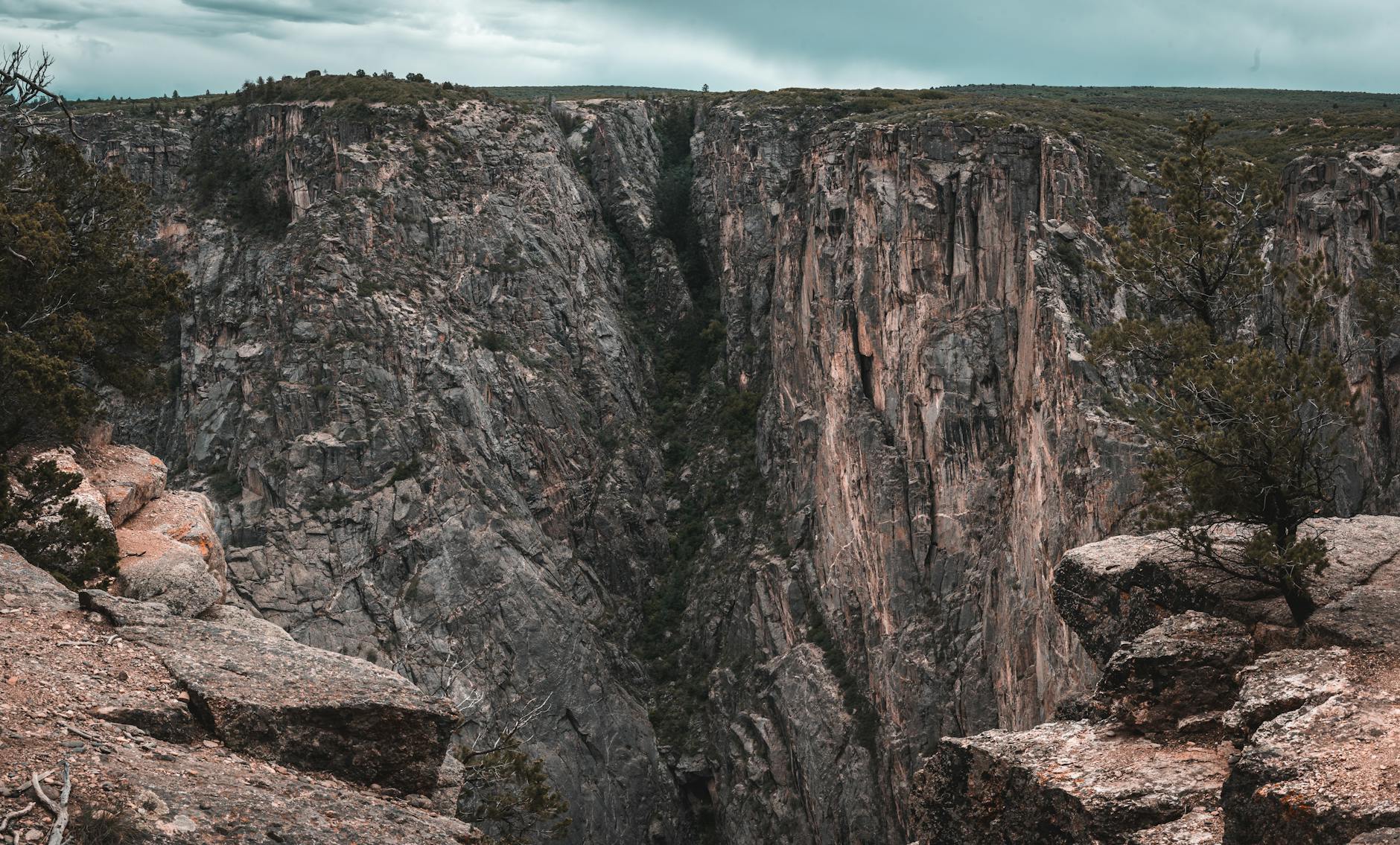 Stunning aerial view of Black Canyon's rugged cliffs and dramatic landscape.