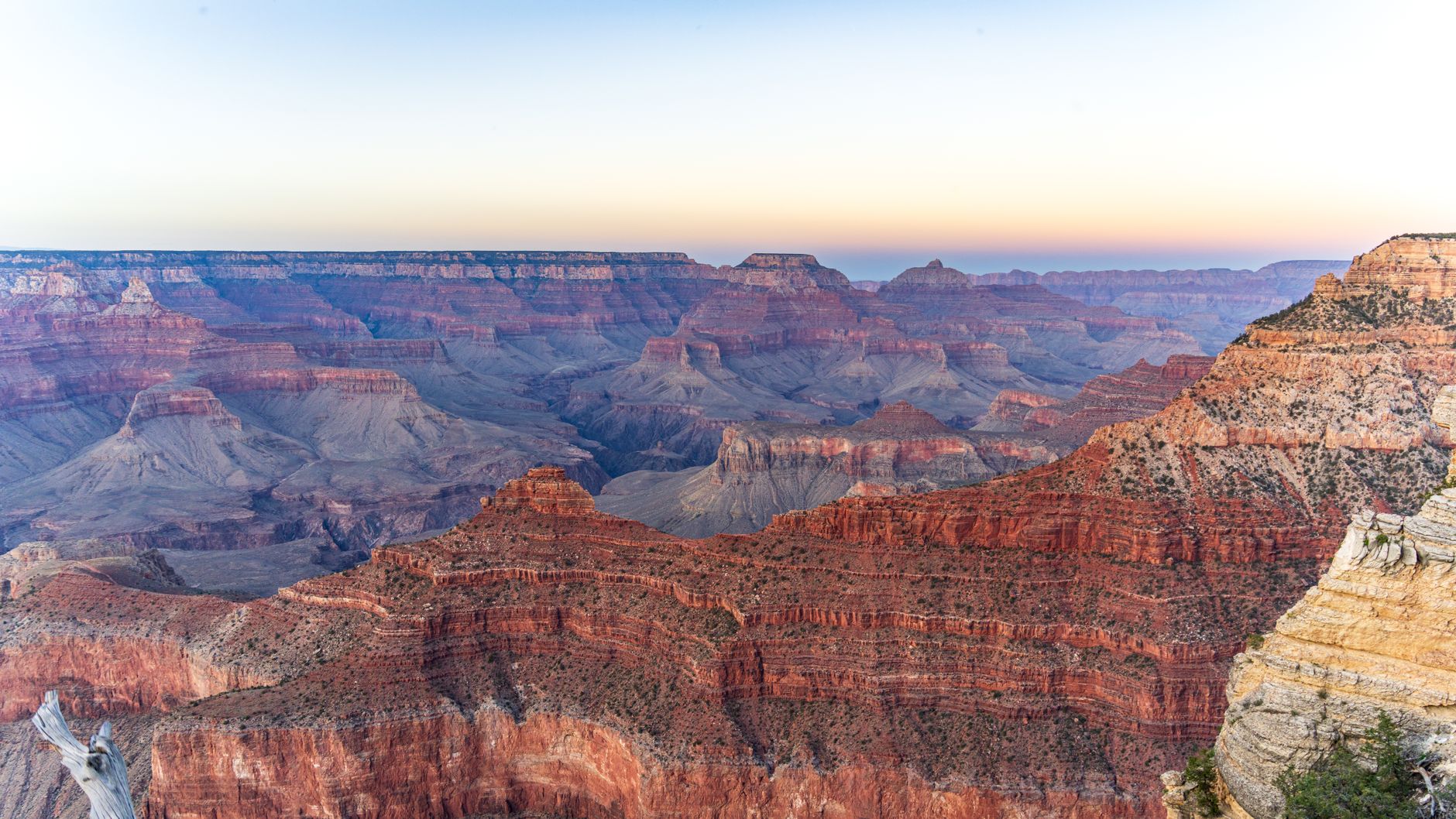 Experience the grandeur of the Grand Canyon with this stunning sunrise view from the South Rim.