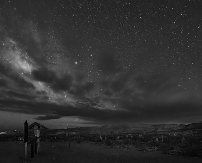 Captivating starry night view over Terlingua, Texas. Stunning celestial display with desert foreground.