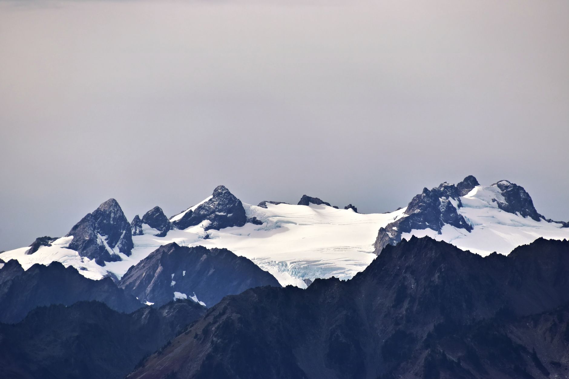A breathtaking view of Mount Olympus with snow-capped peaks in Washington, USA.