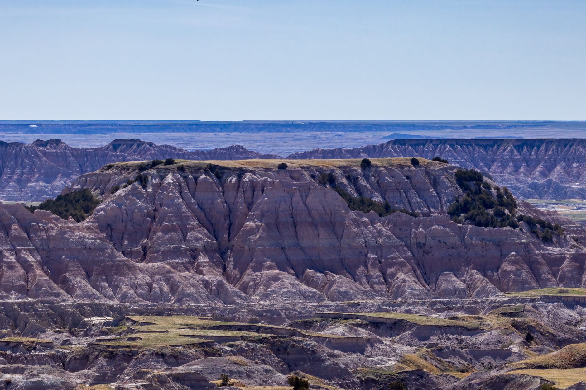 A breathtaking view of the rugged terrain and rock formations in Badlands National Park.