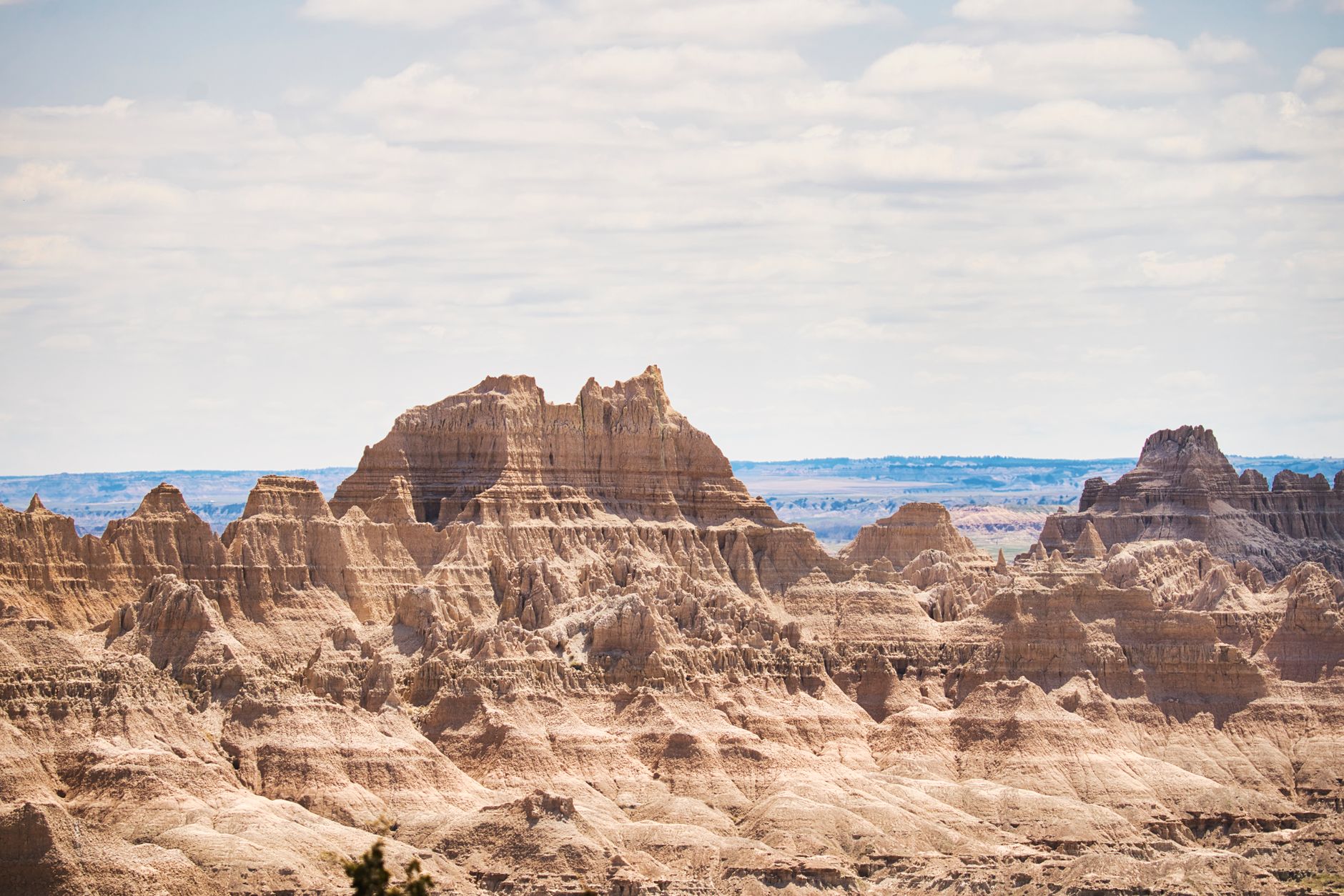 Stunning natural rock formations in Badlands National Park under a clear sky.