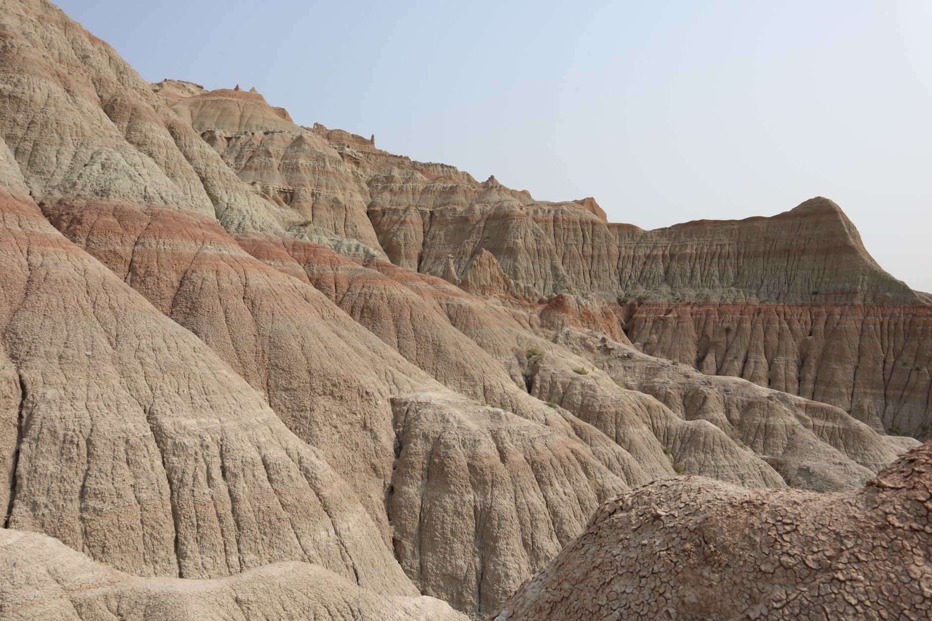 Explore the unique rock formations and arid landscapes of Badlands National Park.