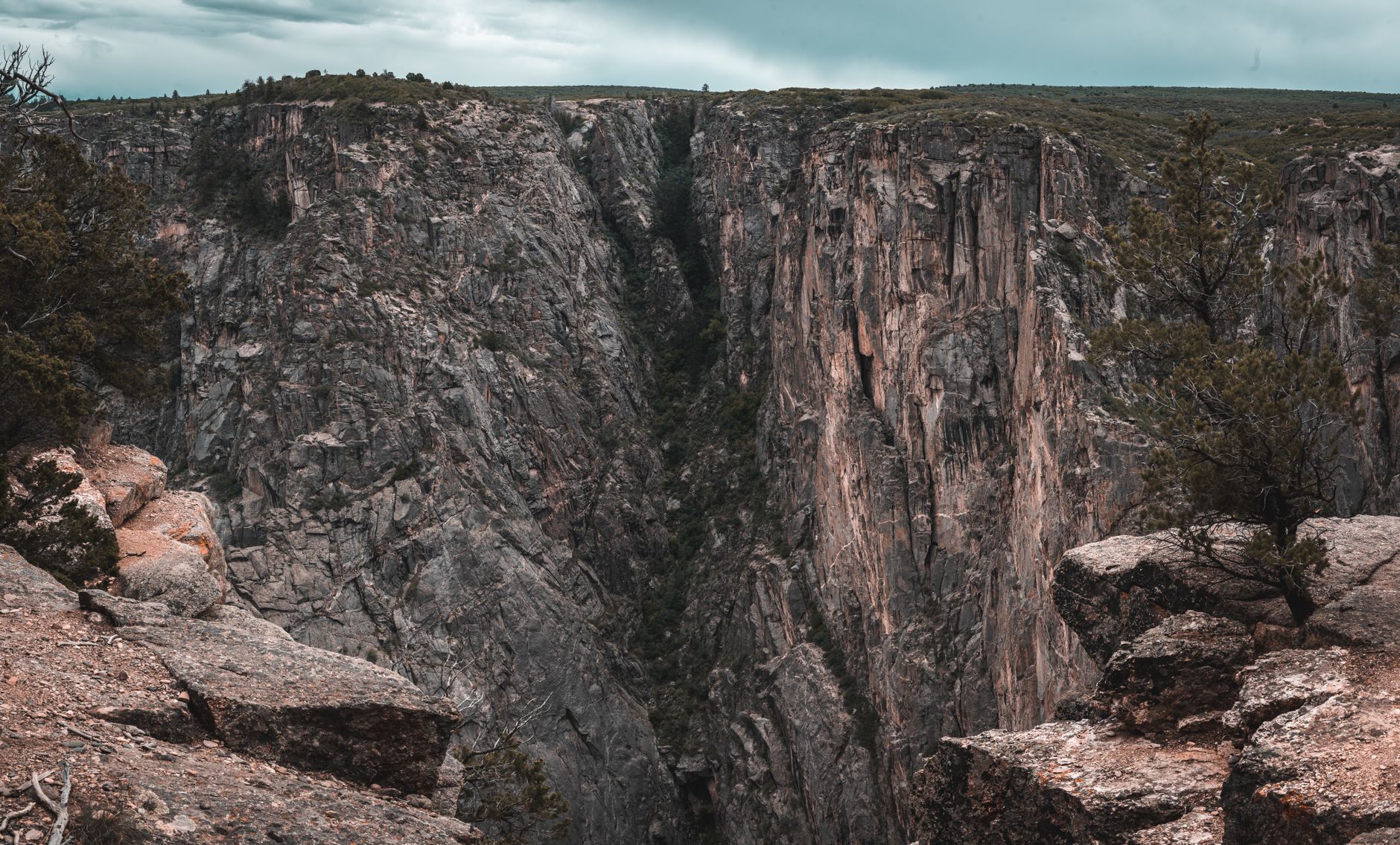 Stunning aerial view of Black Canyon's rugged cliffs and dramatic landscape.