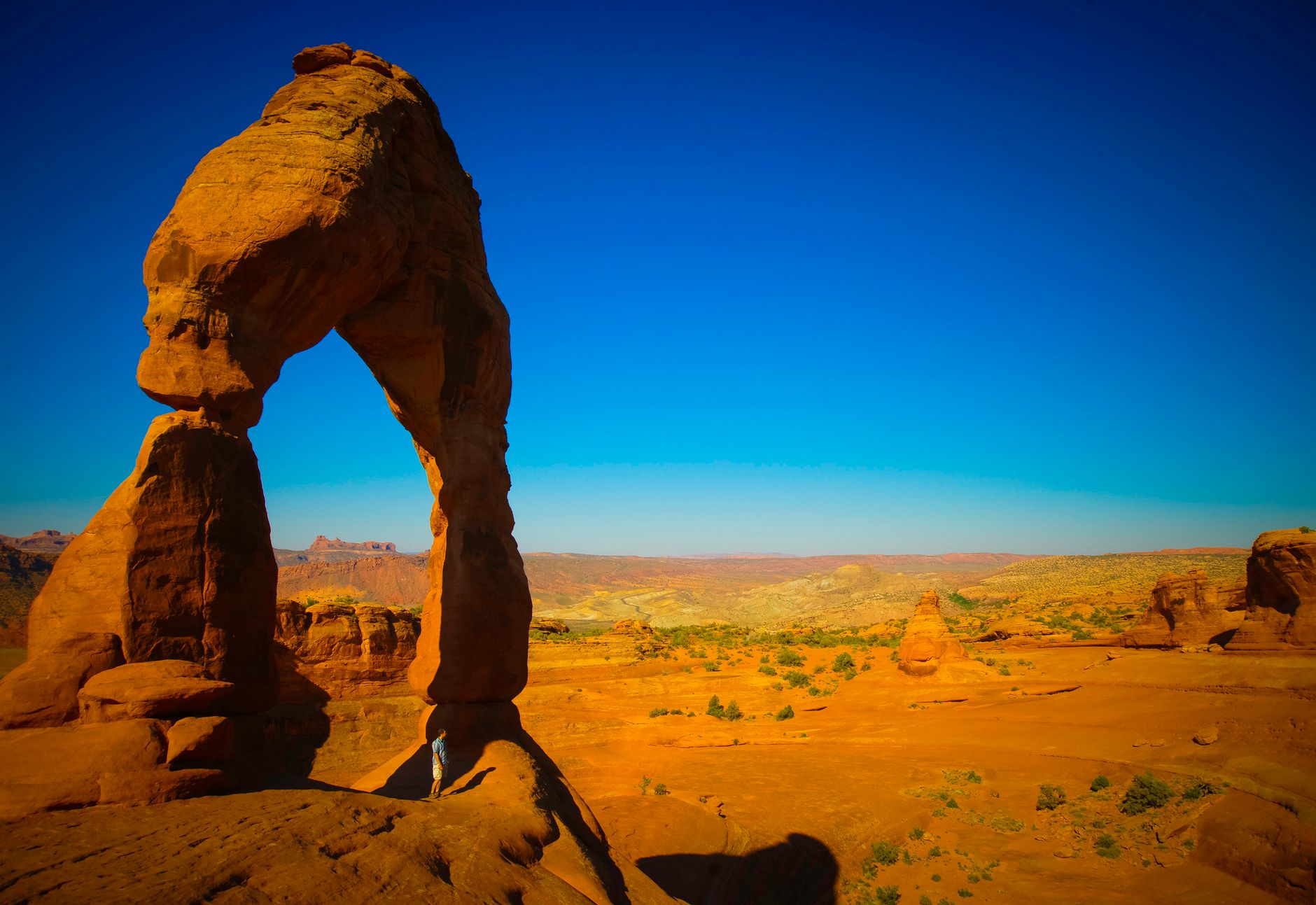 Captivating view of Delicate Arch under a clear blue sky in Arches National Park, Utah.