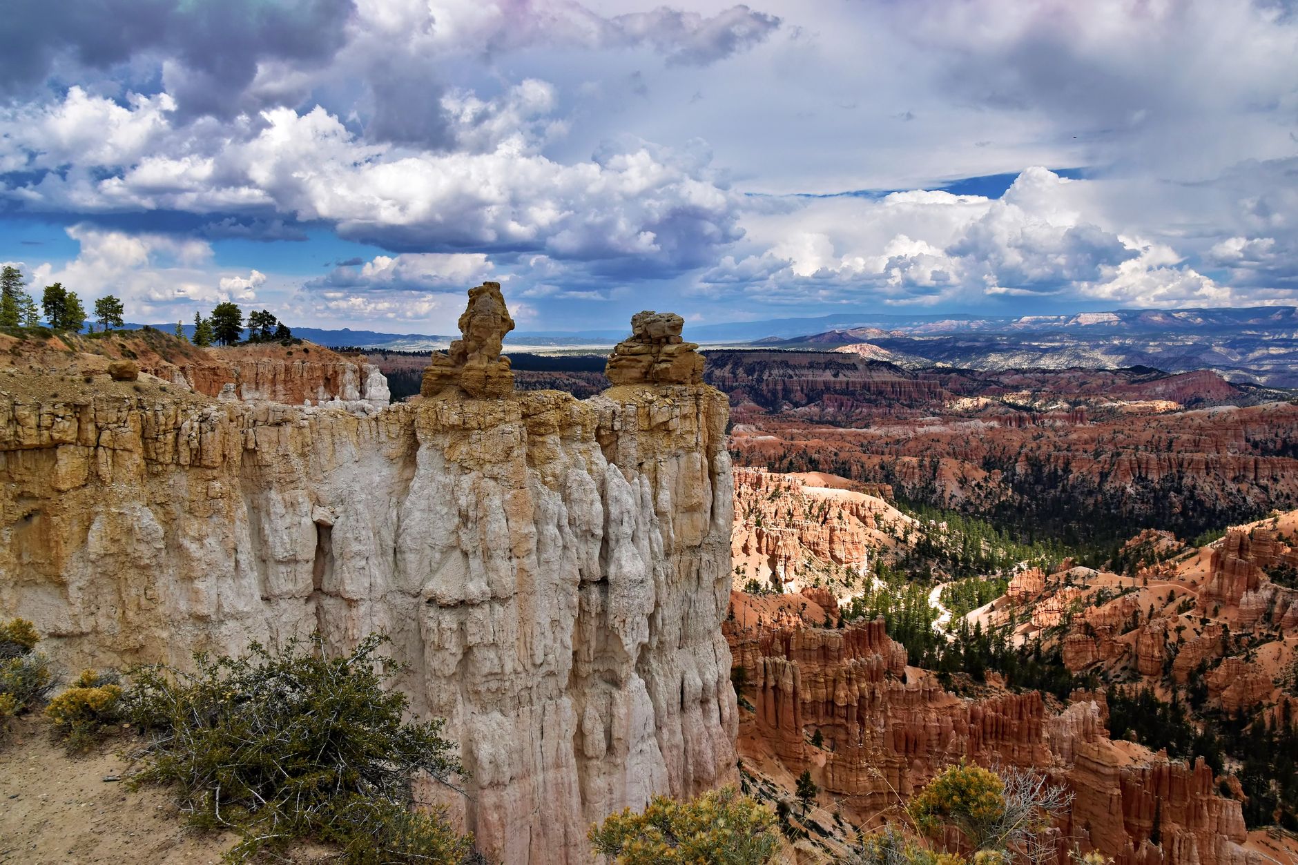 Stunning view of unique rock formations under a vibrant sky in Bryce Canyon National Park.