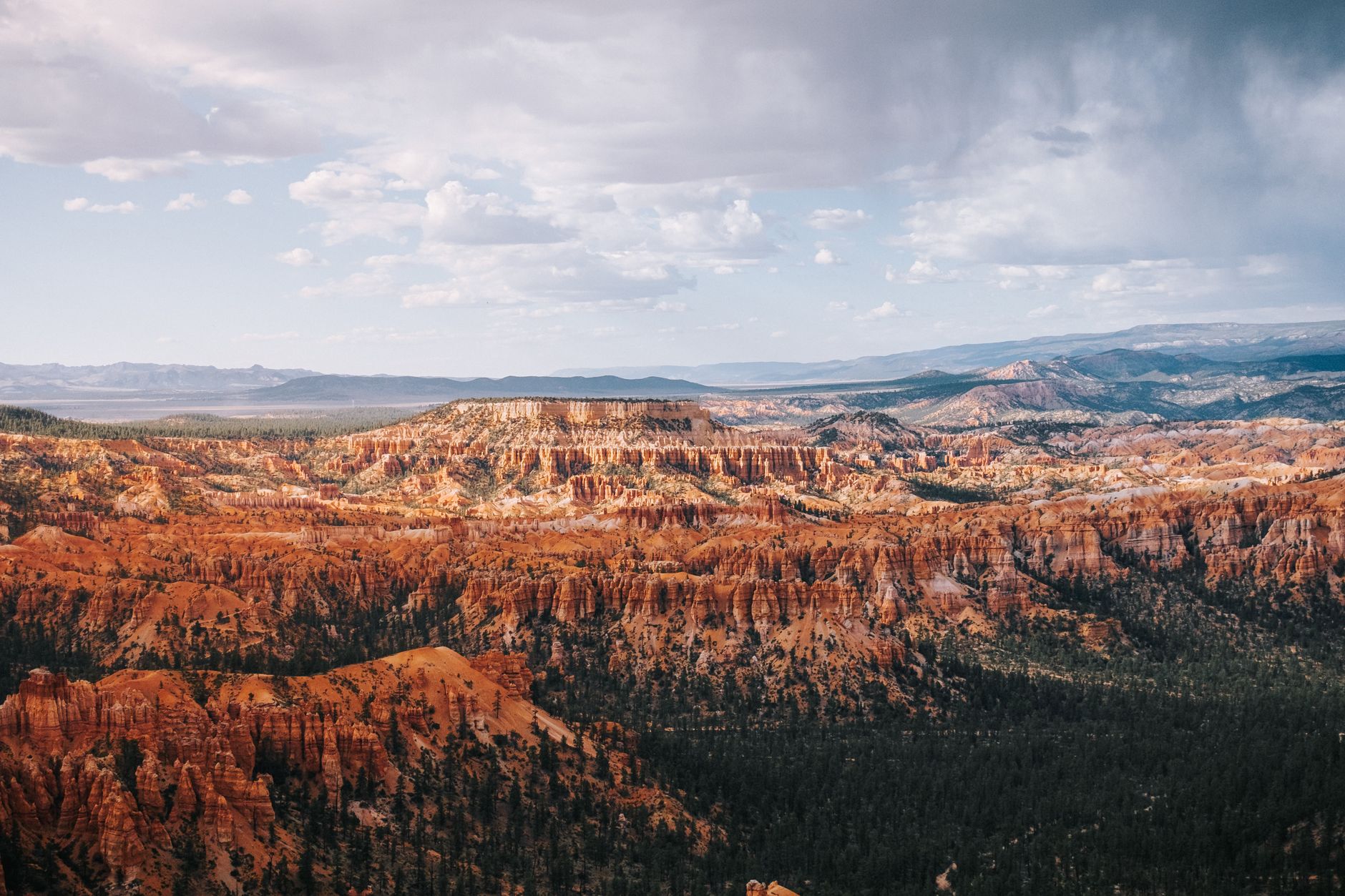 Explore the breathtaking landscape of Bryce Canyon National Park in Utah under a bright, clear sky.