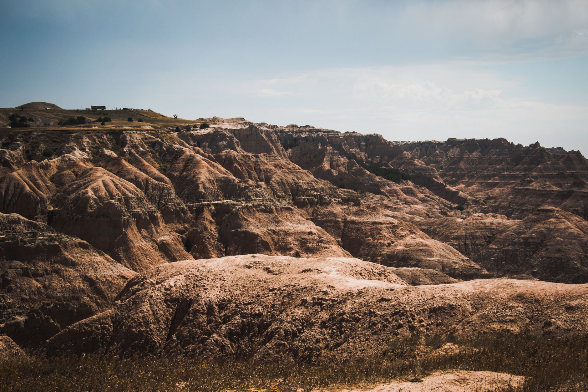 Explore the rugged beauty of Badlands National Park with its unique geological formations.