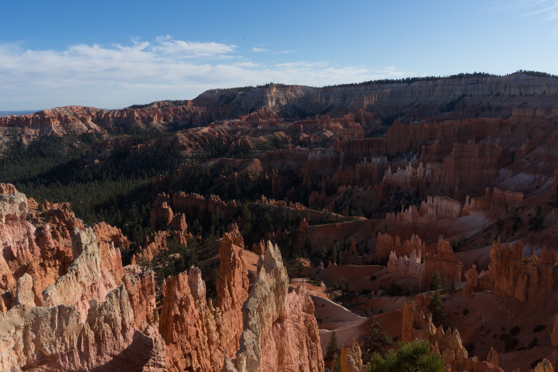 Breathtaking landscape of Bryce Canyon's unique rock formations in Utah under a clear blue sky.