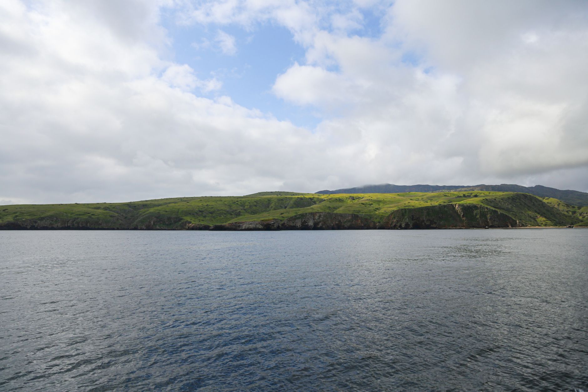 Explore the serene coastline of Channel Islands National Park under a beautiful sky.