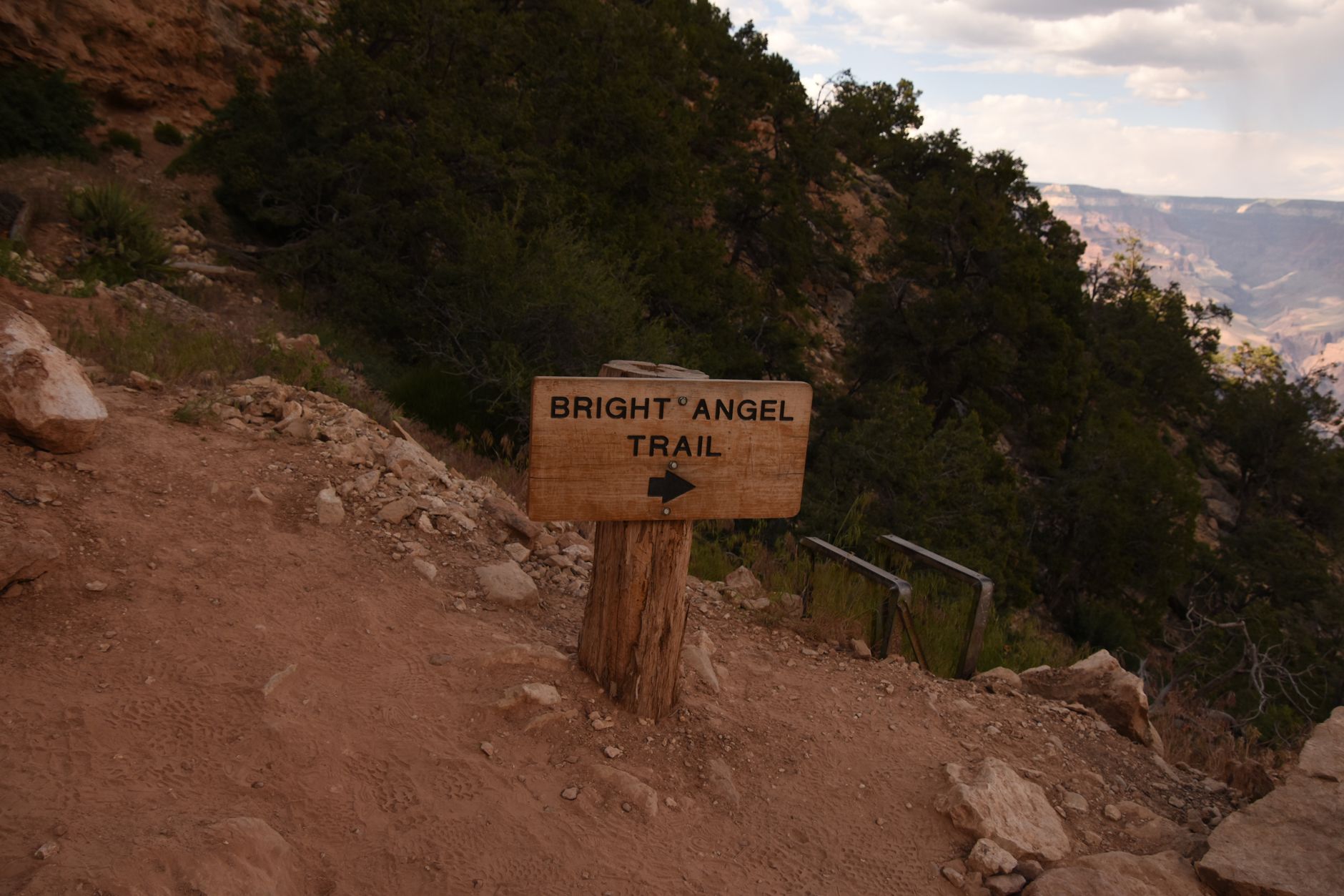 Explore the iconic Bright Angel Trail amidst the breathtaking landscape of the Grand Canyon.