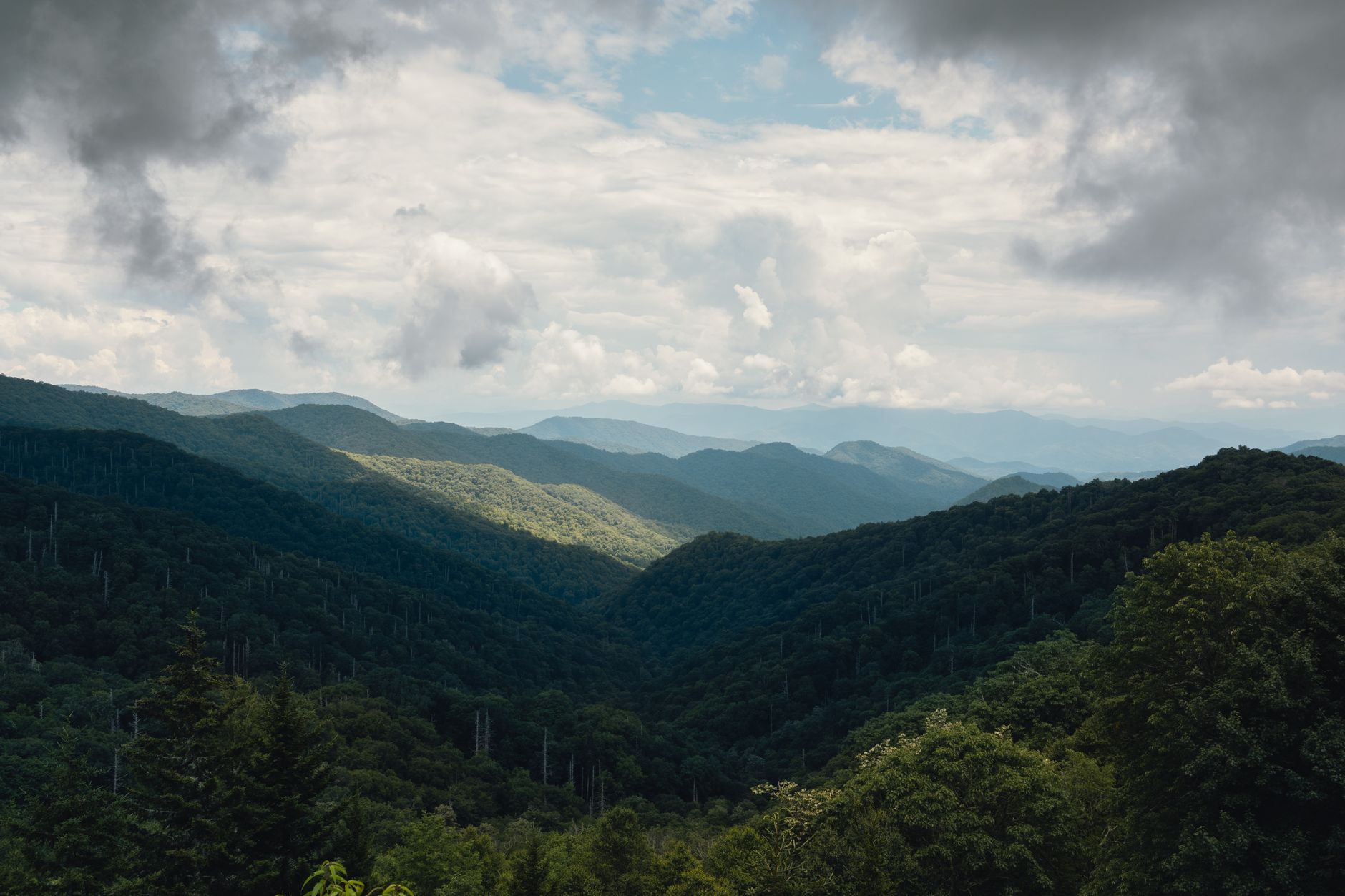 Beautiful view of the Blue Ridge Mountains under dramatic clouds in Gatlinburg, Tennessee.