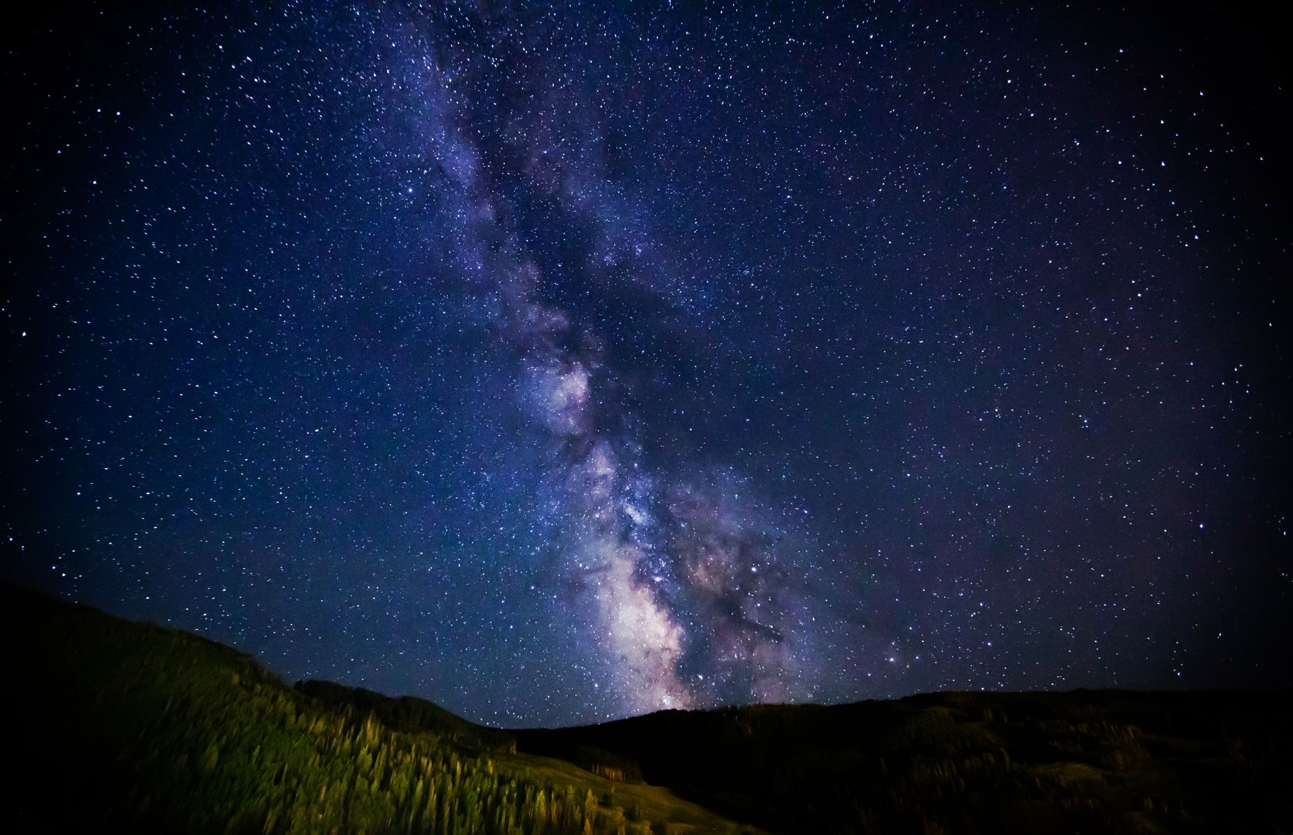 Stunning view of the Milky Way across a starry night sky in Colorado, USA.