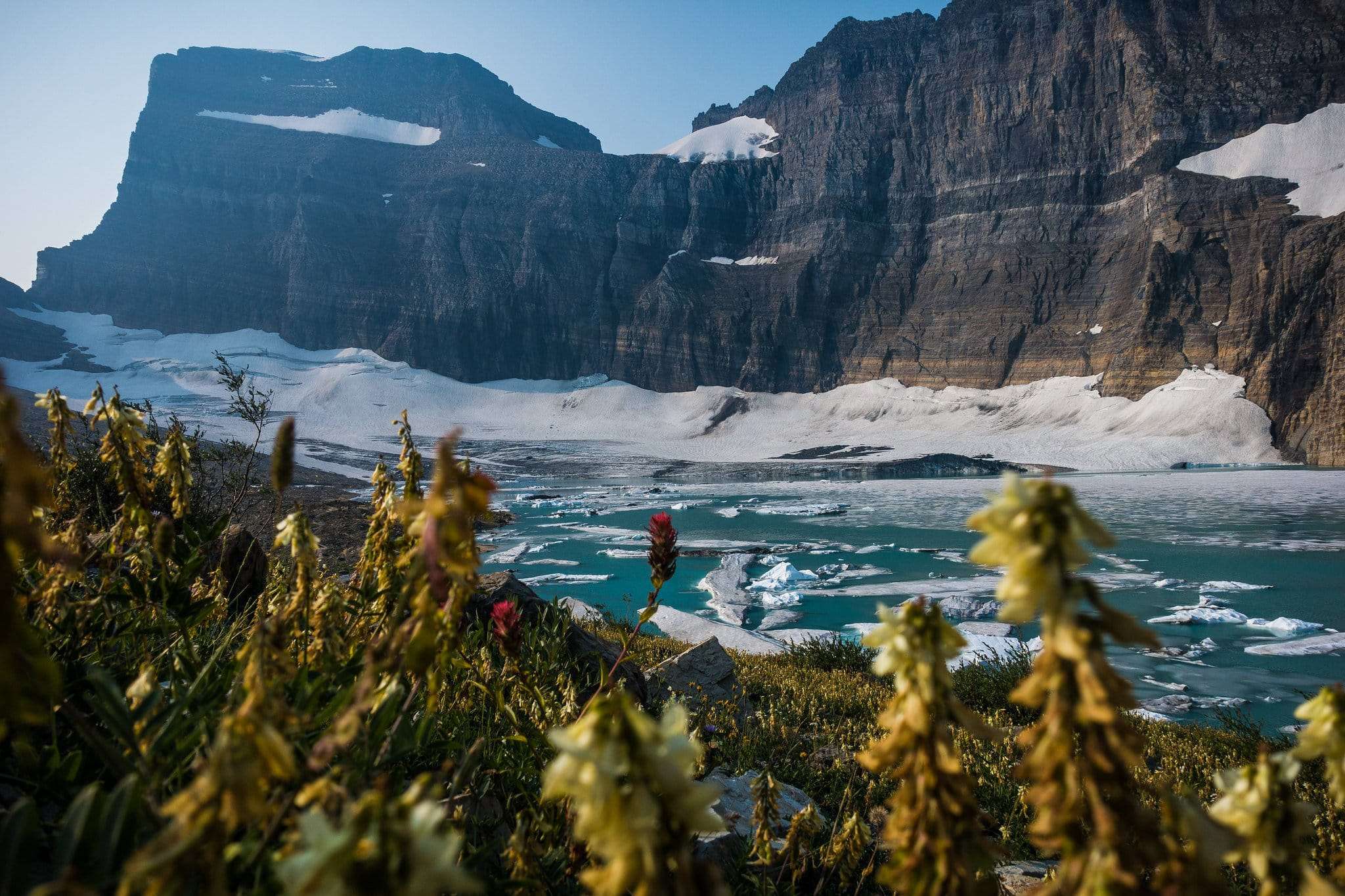 Grinnell Glacier and turquoise meltwater lake in Many Glacier valley, Glacier National Park