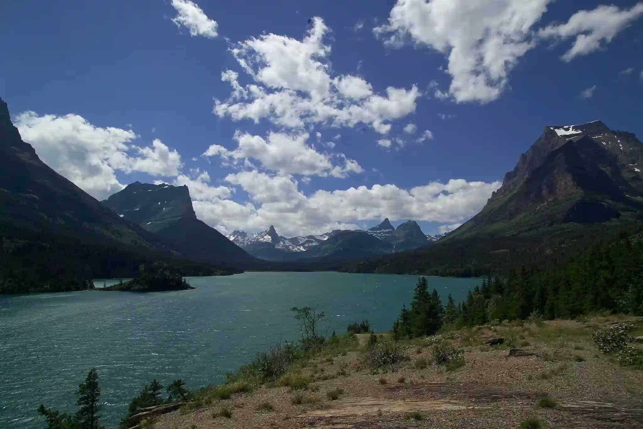 St. Mary Lake reflecting mountains at Sun Point in eastern Glacier National Park
